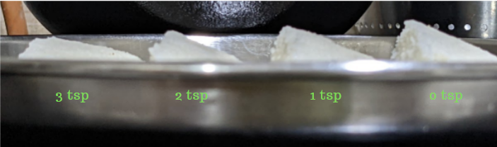 idlis made with different amounts of fenugreek paste added - side view