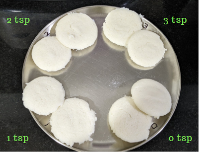 idlis made with different amounts of fenugreek paste added